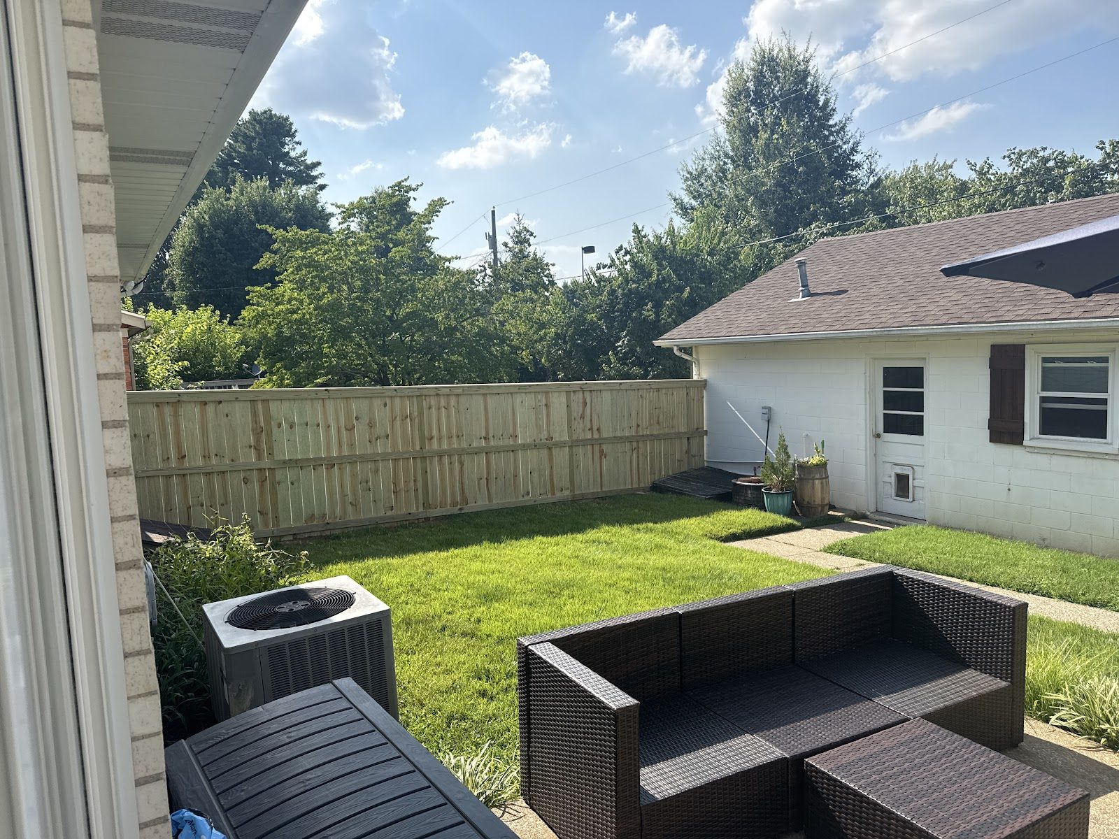 Wood privacy fence in a backyard
